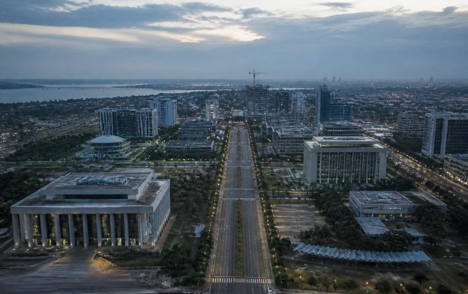 Aerial view of a contemporary capital city at dusk